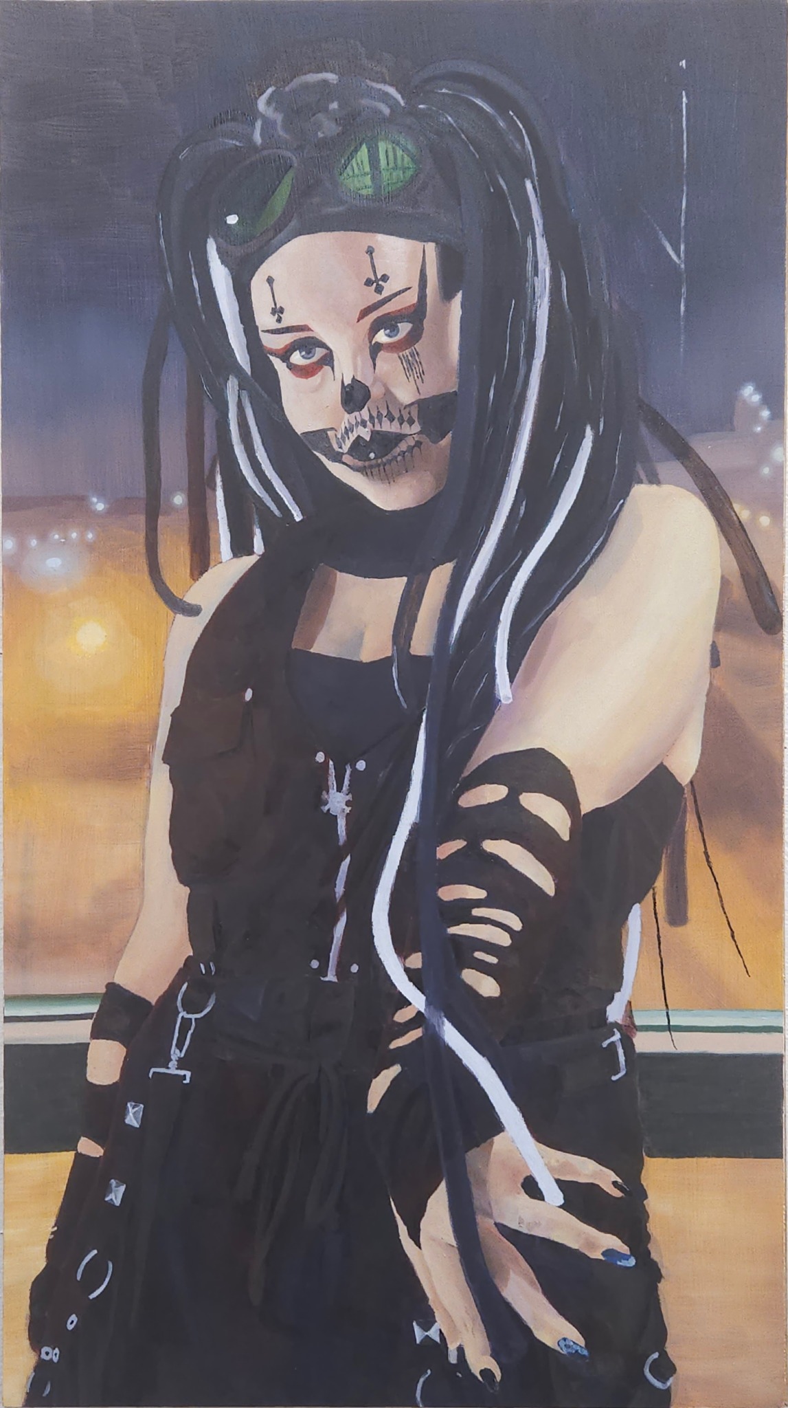 Person with skull makeup, black and white hair, wearing black clothing and gloves, standing indoors with sunset view.