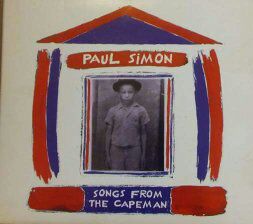 A drawing of a house with red and blue walls, a black-and-white photo of a boy in the center, and text reading 'Paul Simon' and 'Songs from the Capeman'.