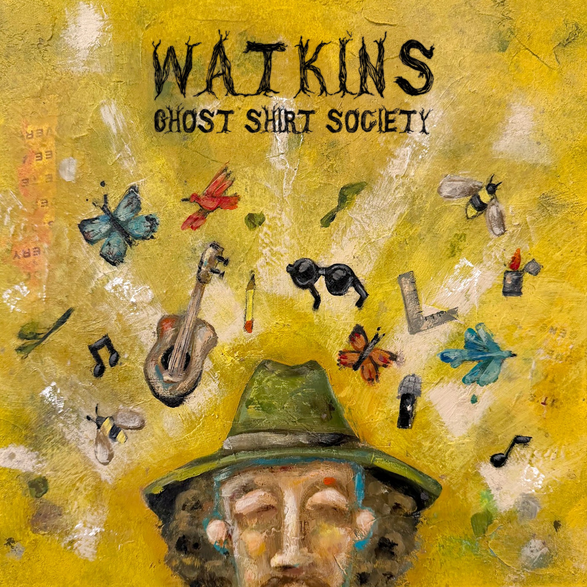 Cover art with yellow background, butterflies, a guitar, sunglasses, and makeup items, with text reading 'Watkins Ghost Shirt Society'.