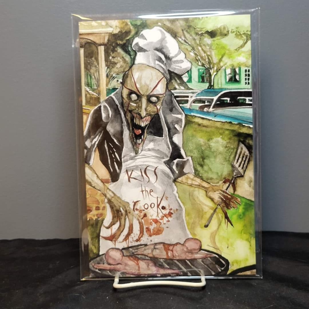 A zombie chef with glowing eyes and a menacing expression, holding a fork and a bloody knife, in a garden setting.