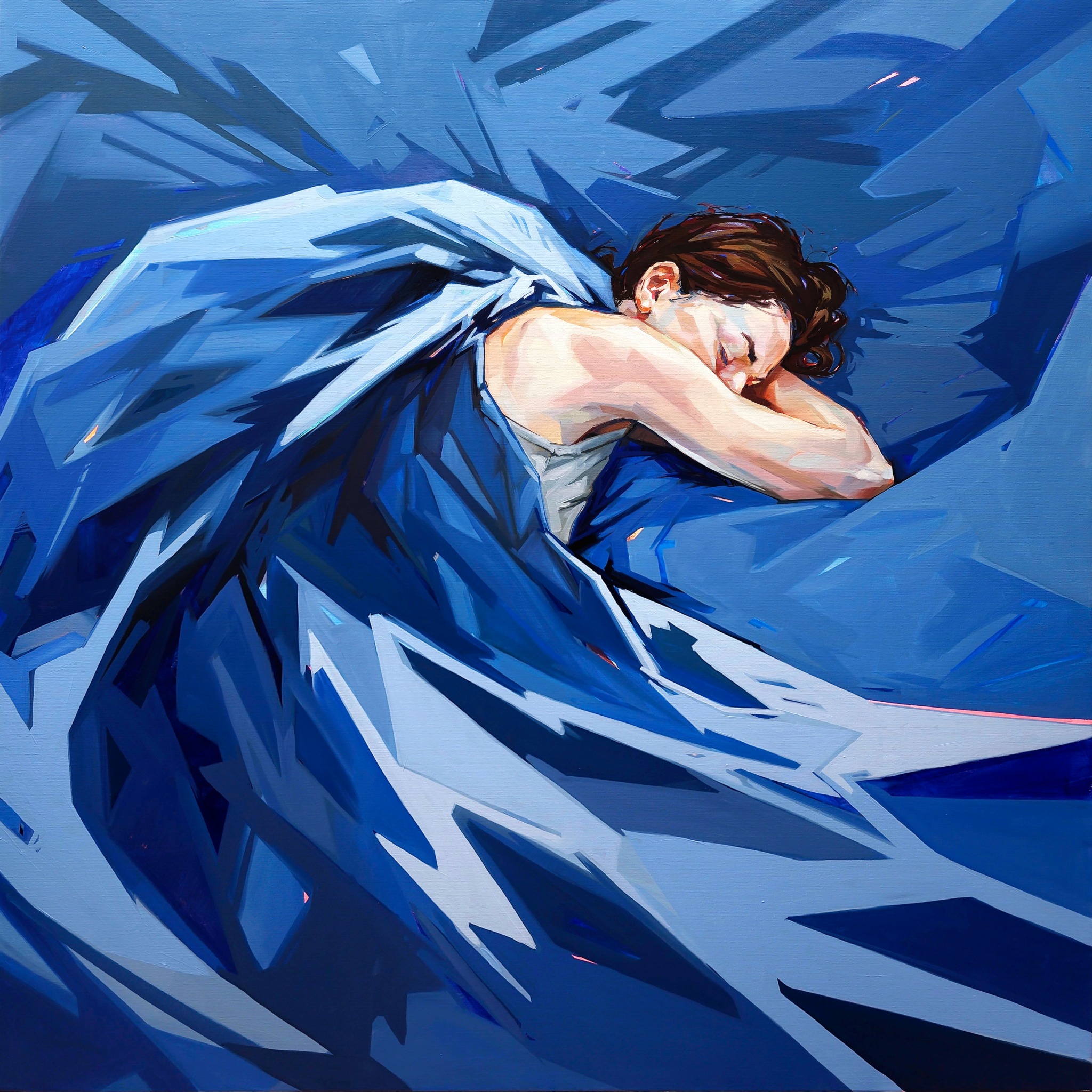 Person sleeping with head on arm, covered by blue blanket, surrounded by abstract blue shapes.