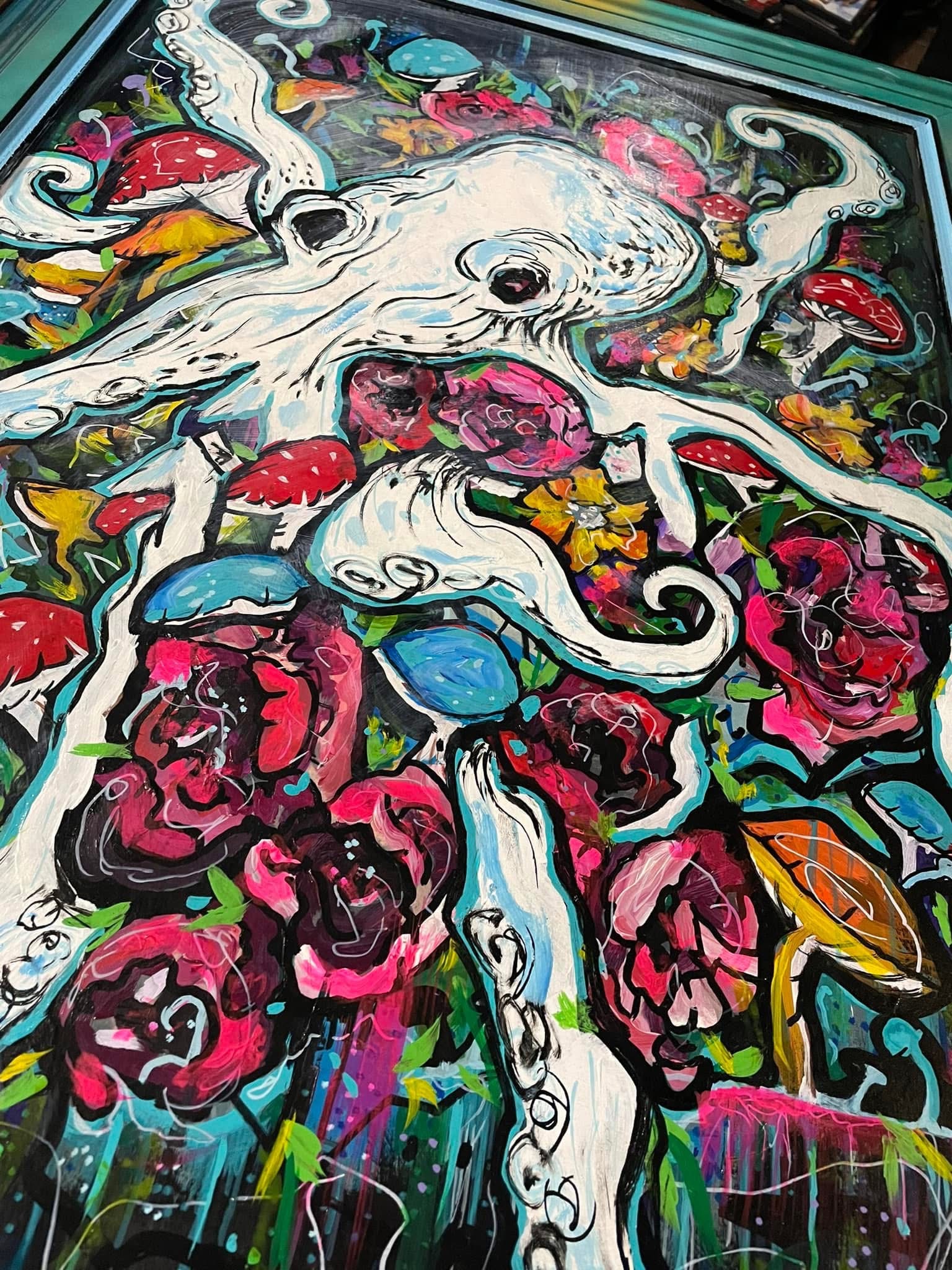 Colorful painting of a white animal, possibly a dog, surrounded by vibrant flowers and abstract shapes.