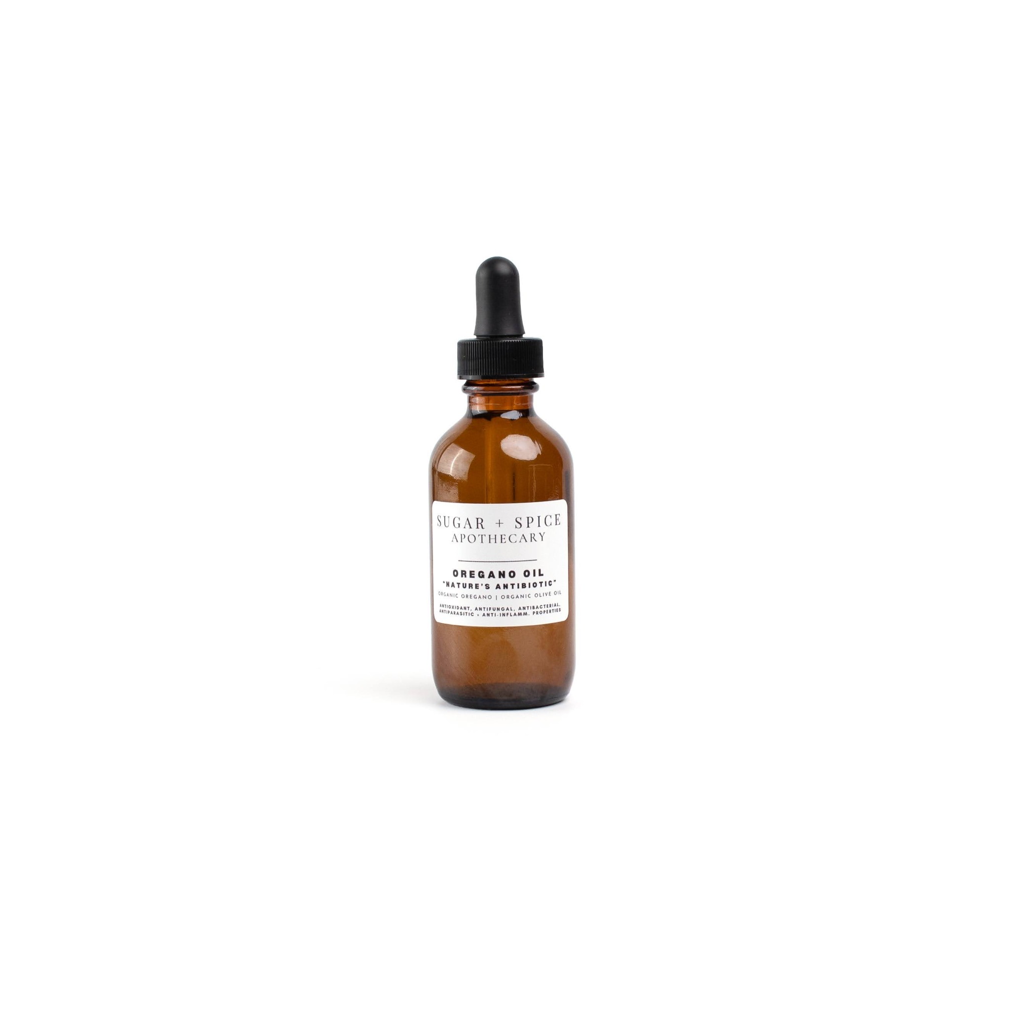 Small amber glass dropper bottle with a black cap and white label, centered on a white background.
