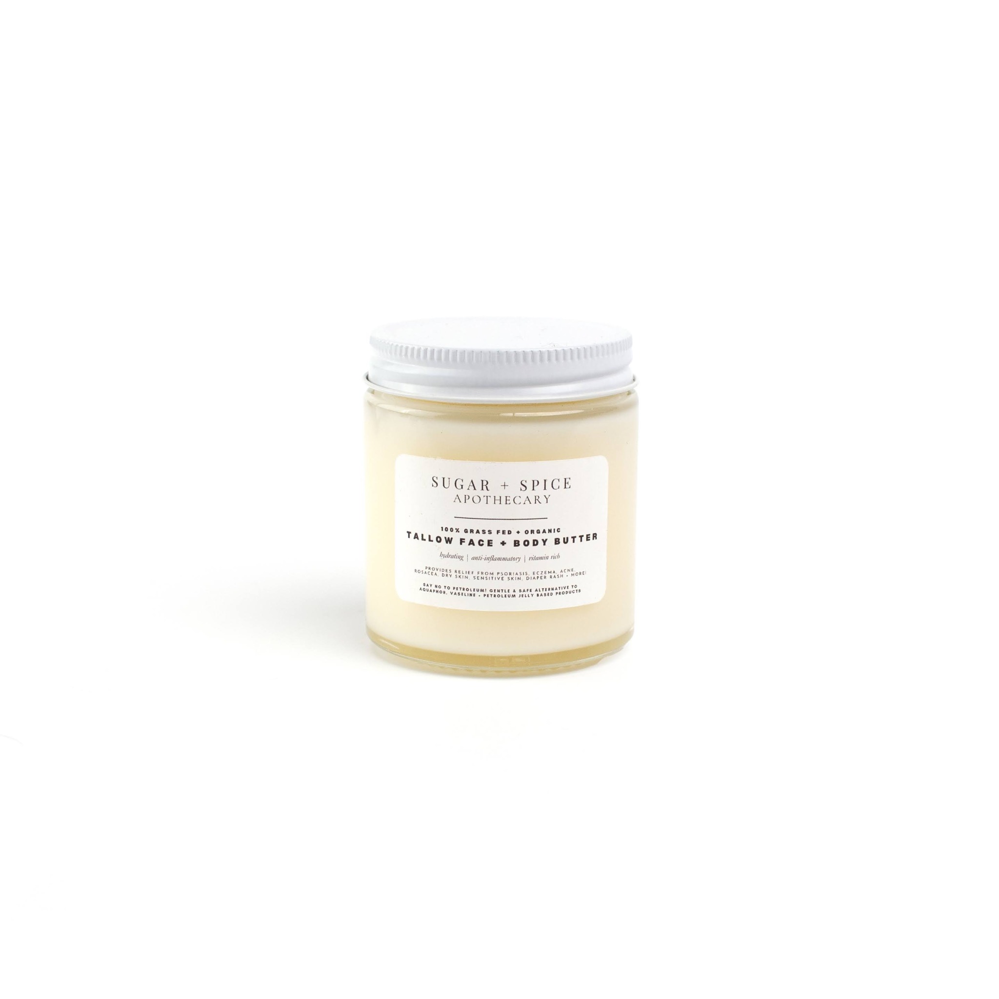 Cream-colored jar with a white lid and a label reading 'Sugar + Spice' and 'Tallow Face Moisturizer'.