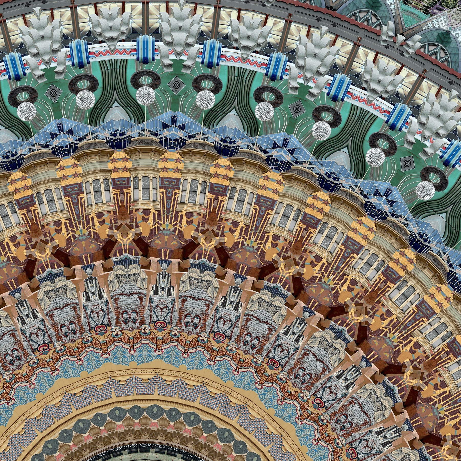 A colorful, circular pattern of amusement park rides and structures viewed from above.