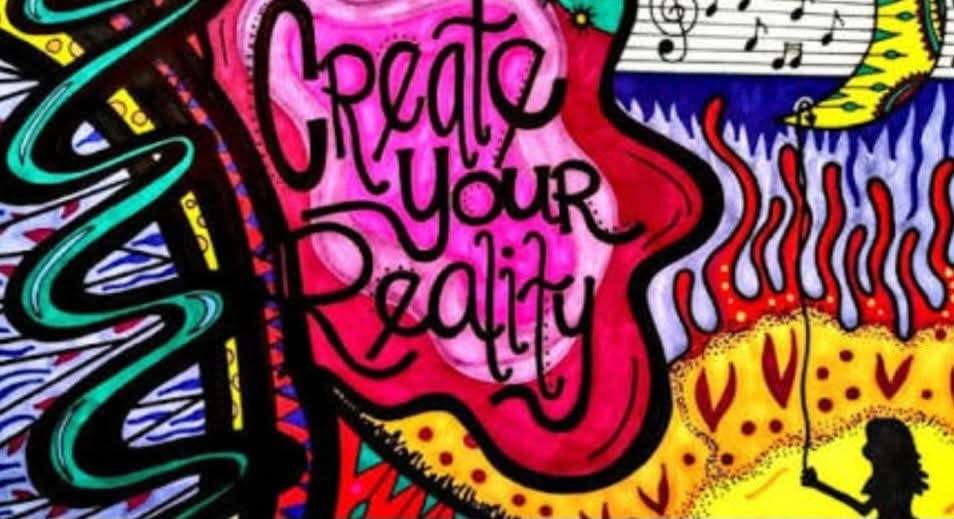 Colorful graffiti art with the phrase 'Create Your Reality' inside a pink profile of a face, surrounded by abstract patterns.