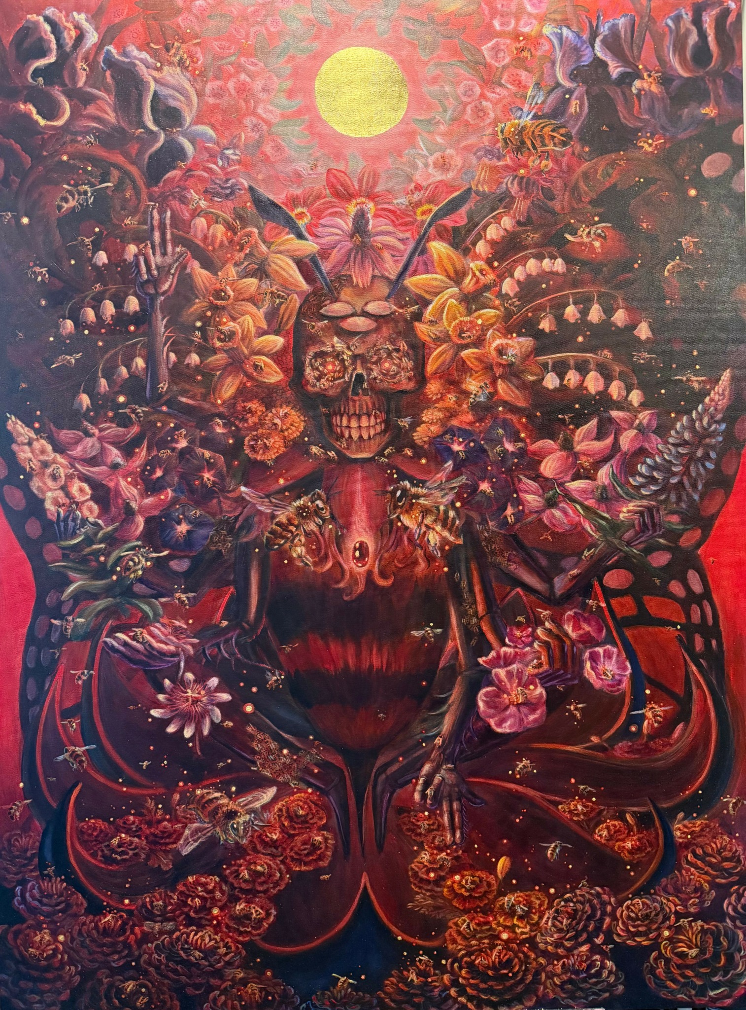 Vivid, detailed artwork featuring a central skull with floral and fantastical elements, a bright yellow sun at the top, and dark, intricate surroundings.