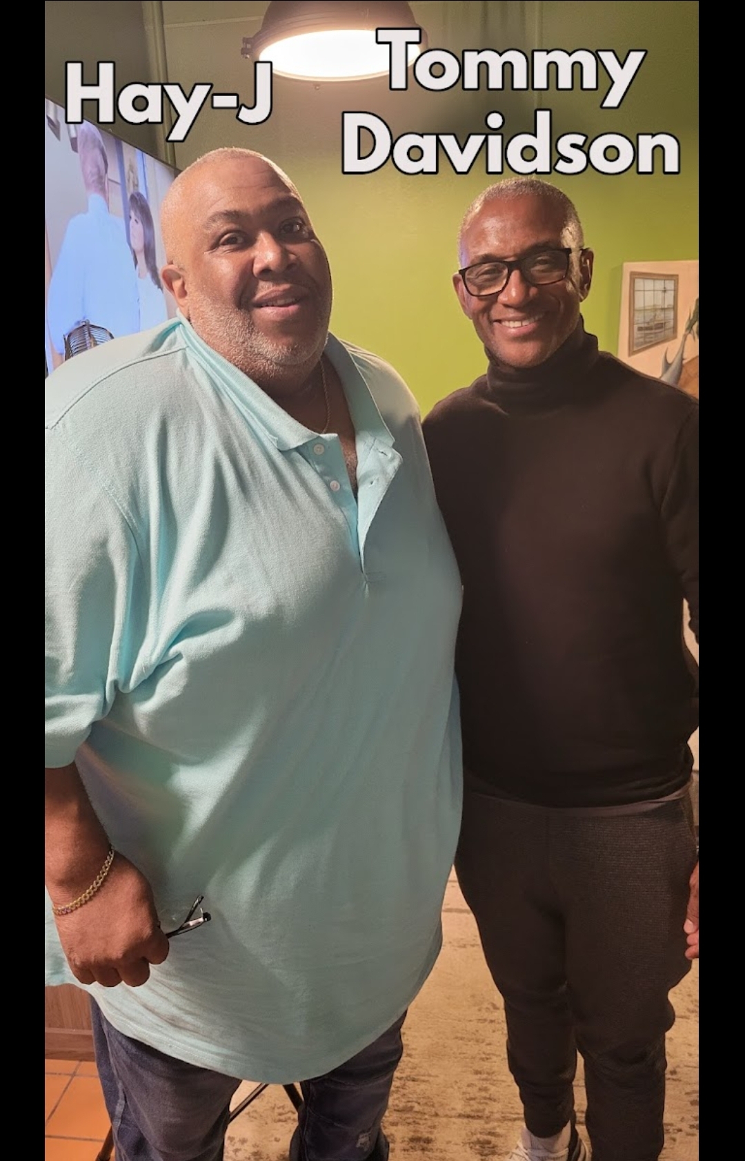 Two men standing indoors, smiling, with text 'Hay-J Tommy Davidson' above them.