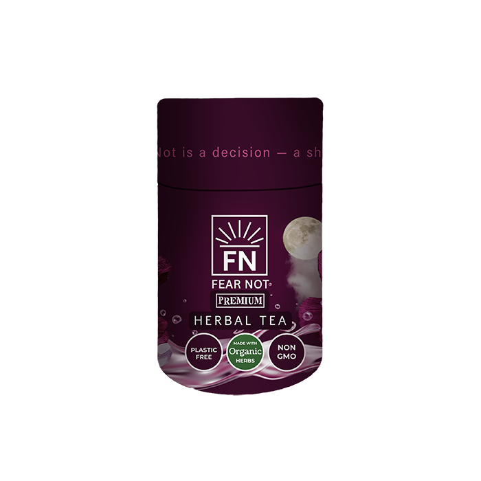 Package of herbal tea with moon and purple background, labeled 'Fear Not' and 'Premium,' with icons for organic, plastic-free, and non-GMO.