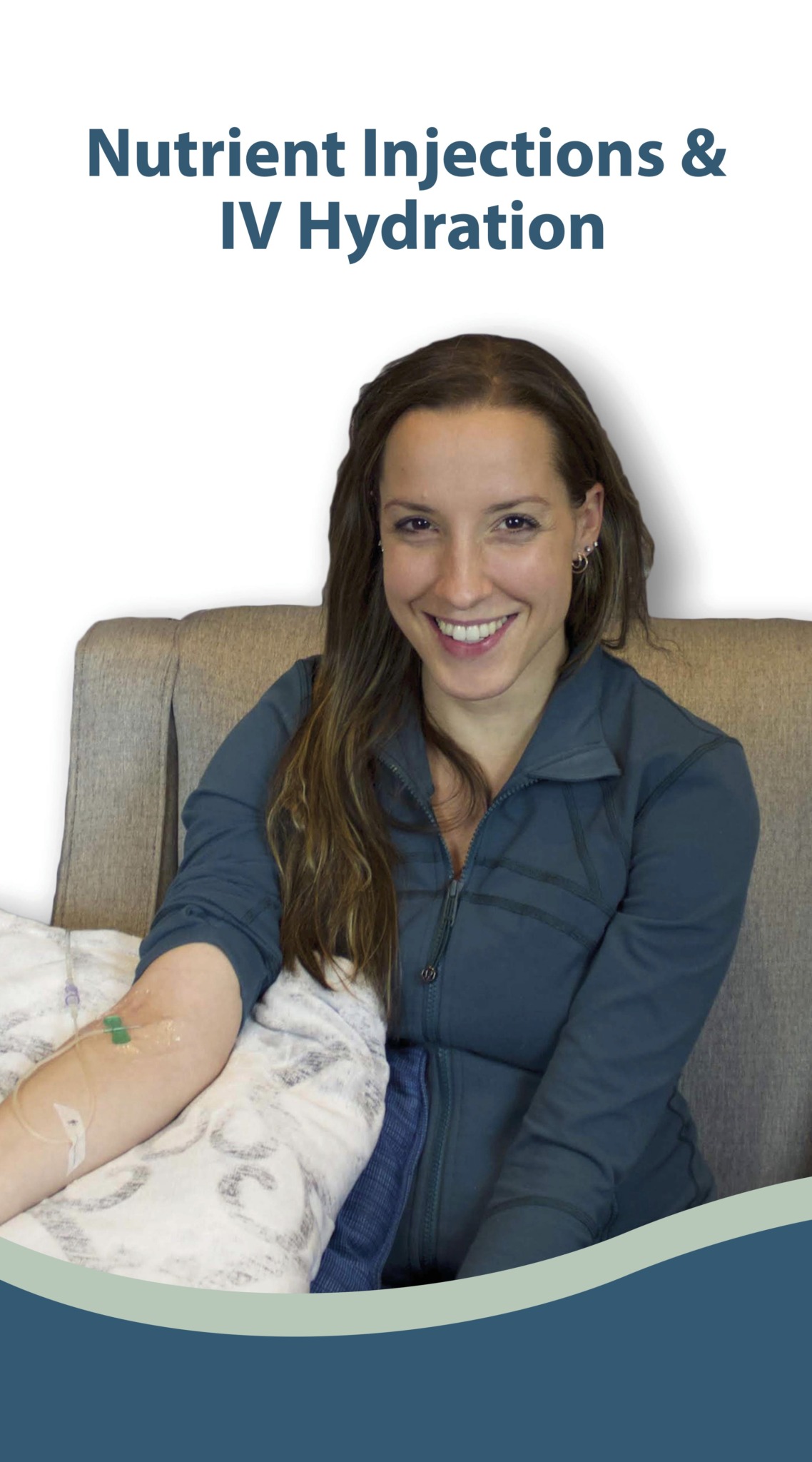 Woman smiling with IV line in arm, sitting on a couch, promoting nutrient injections and IV hydration.