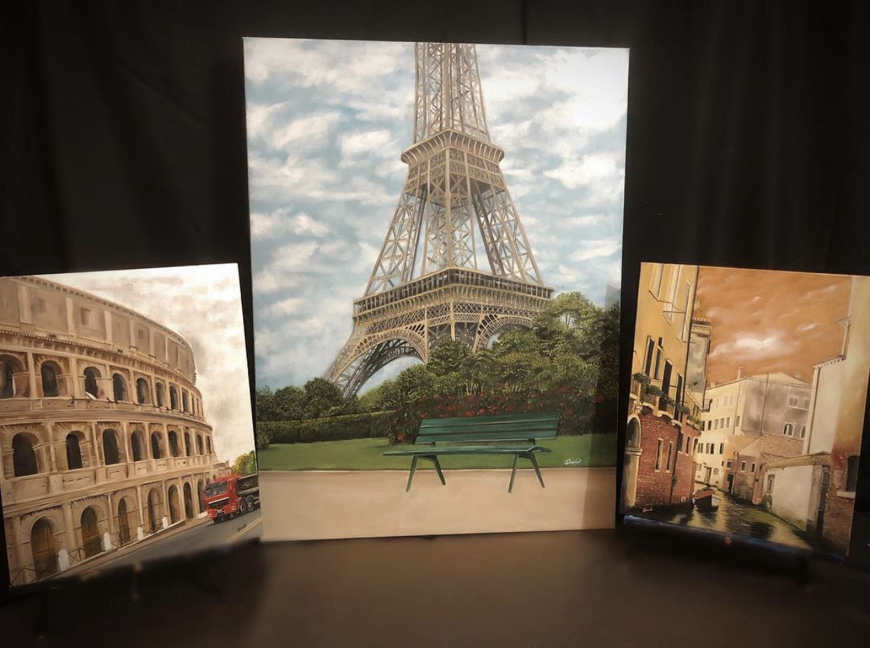 Three paintings of famous landmarks: Eiffel Tower, Colosseum, and Venice canal scene, displayed on a black background.