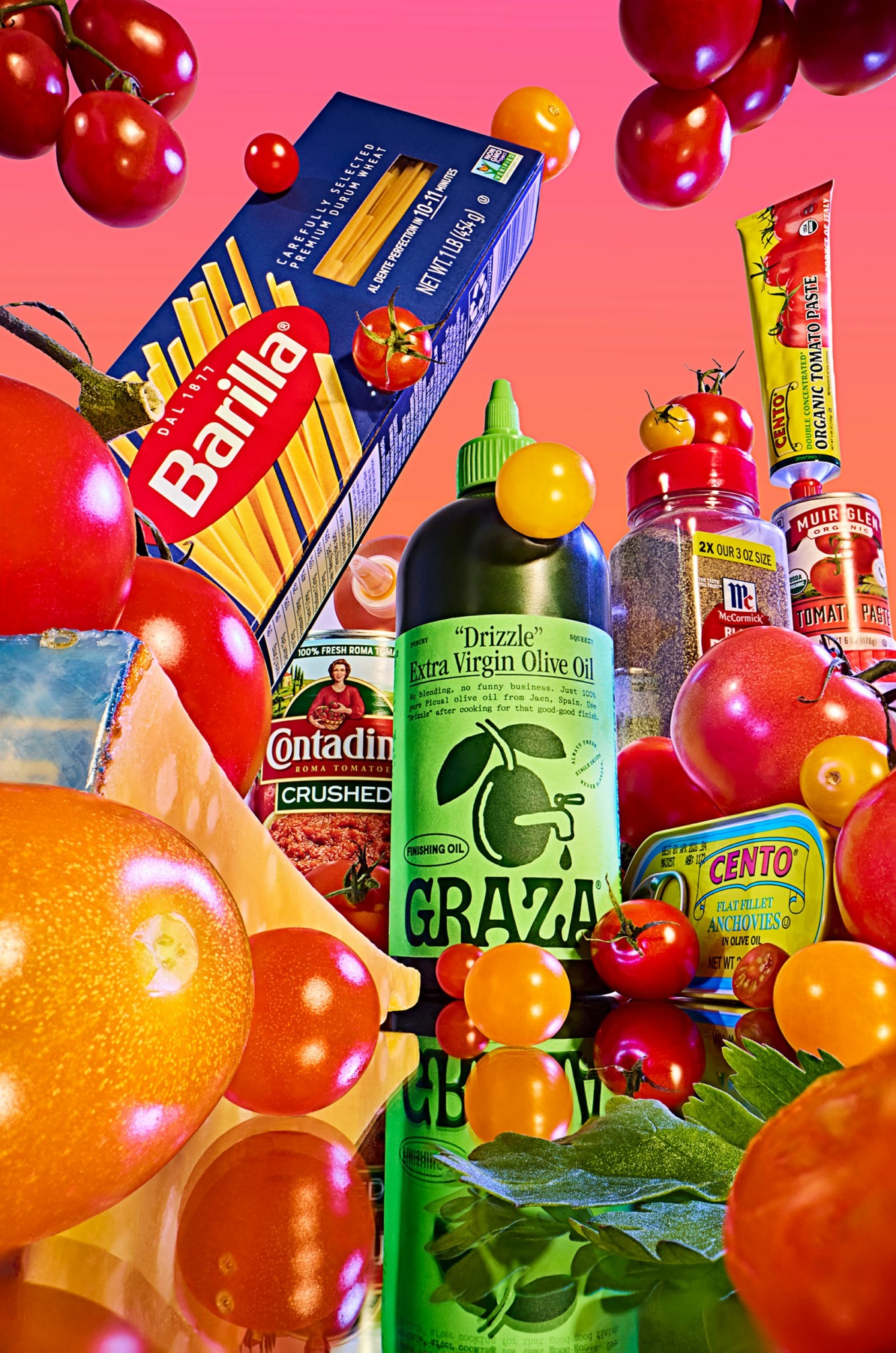 Various food items including pasta, fruits, and condiments on a pink background.