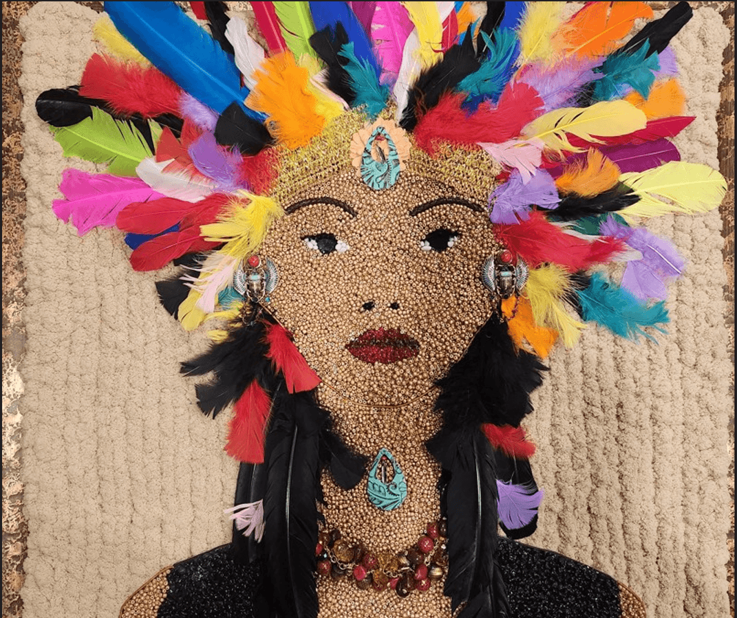 Person wearing a colorful feathered headdress with jewelry and makeup, against a textured background.